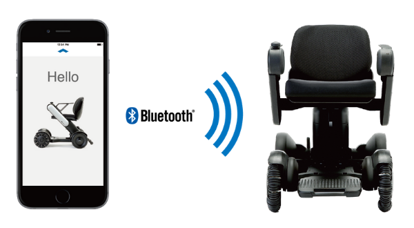 Image of a wheelchair with a phone next to it.